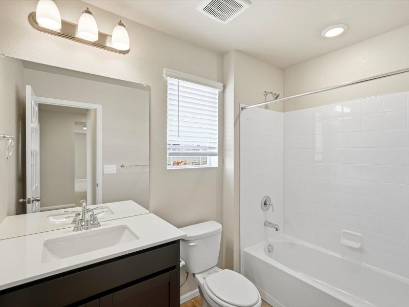 Furnished interior view inside a new home in Buffalo Highlands: The Flora Collection, Commerce City (Image 6).