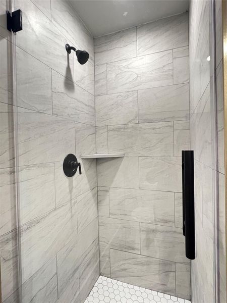 Upstairs guest bathroom with shower