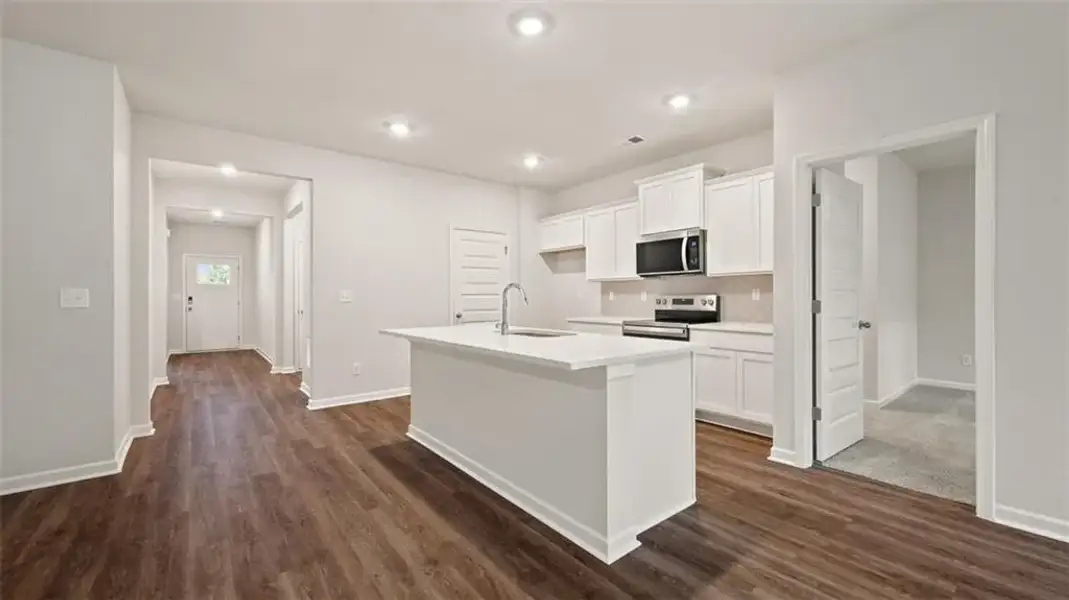 Furnished interior view inside a new home in Champion's Run, Lithonia (Image 6).