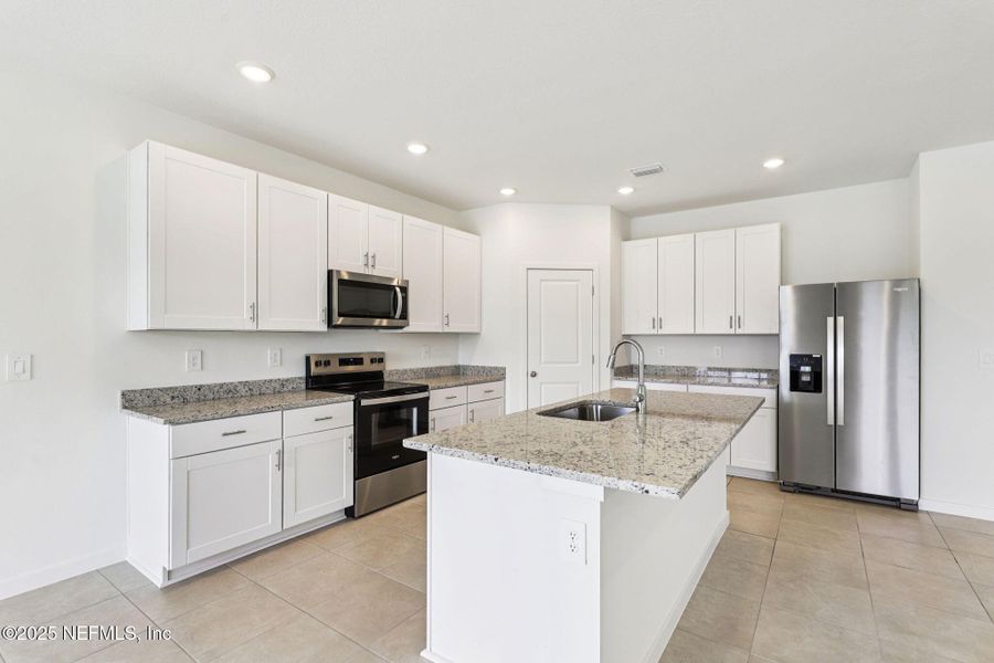 Furnished interior view inside a new home in Lakes at Bella Lago - Signature Series, Green Cove Springs (Image 11).