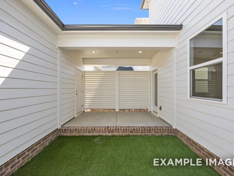 Exterior details and patio area of a home in Forestville Yard, Knightdale (Image 3).
