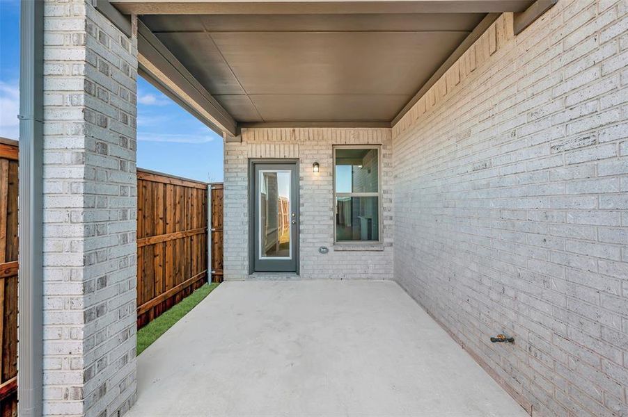 Exterior details and patio area of a home in Lilybrooke at Legacy Hills, Celina (Image 4).