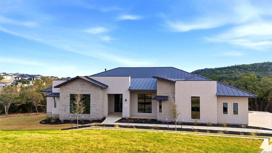 Front exterior of a new home in , San Antonio, TX, highlighting curb appeal (Image 1). Front exterior of a new home in , San Antonio, TX, highlighting curb appeal (Image 1).
