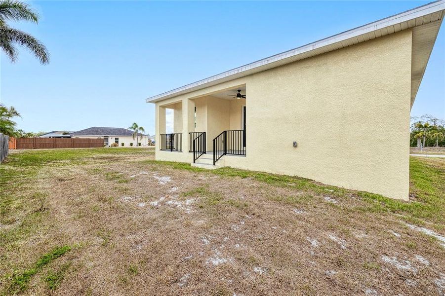 Exterior details and patio area of a home in , Port Charlotte (Image 3).