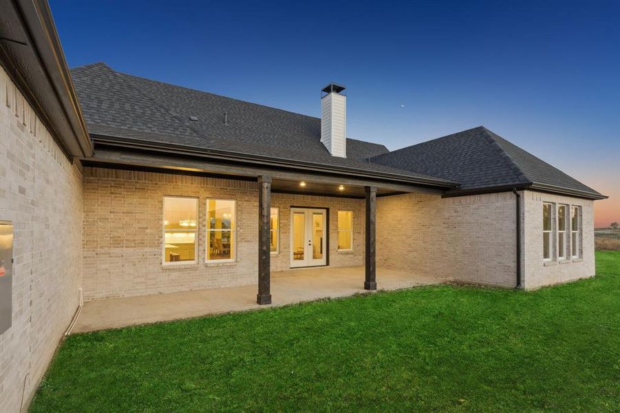Exterior details and patio area of a home in , Justin (Image 3).