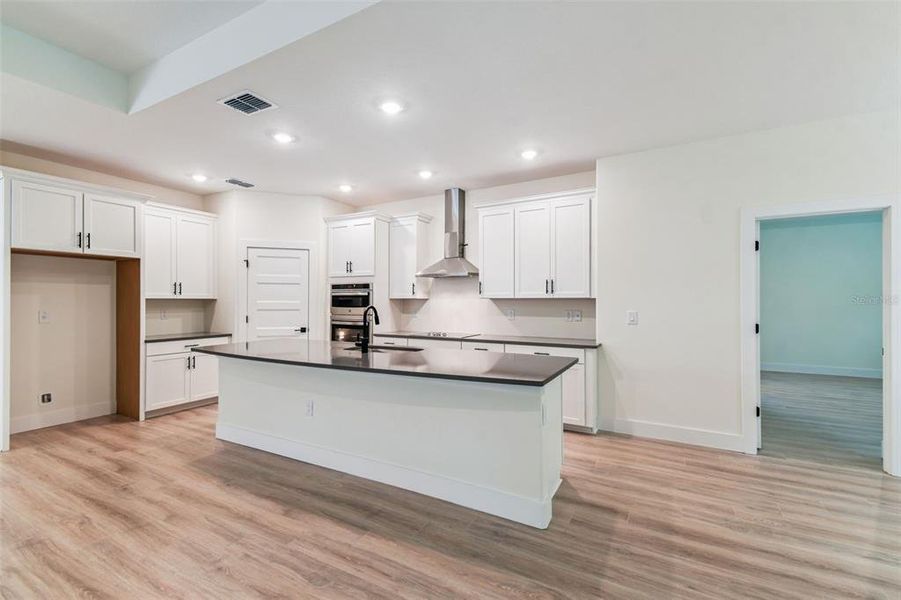 Furnished interior view inside a new home in Hidden Ridge, New Port Richey (Image 38).