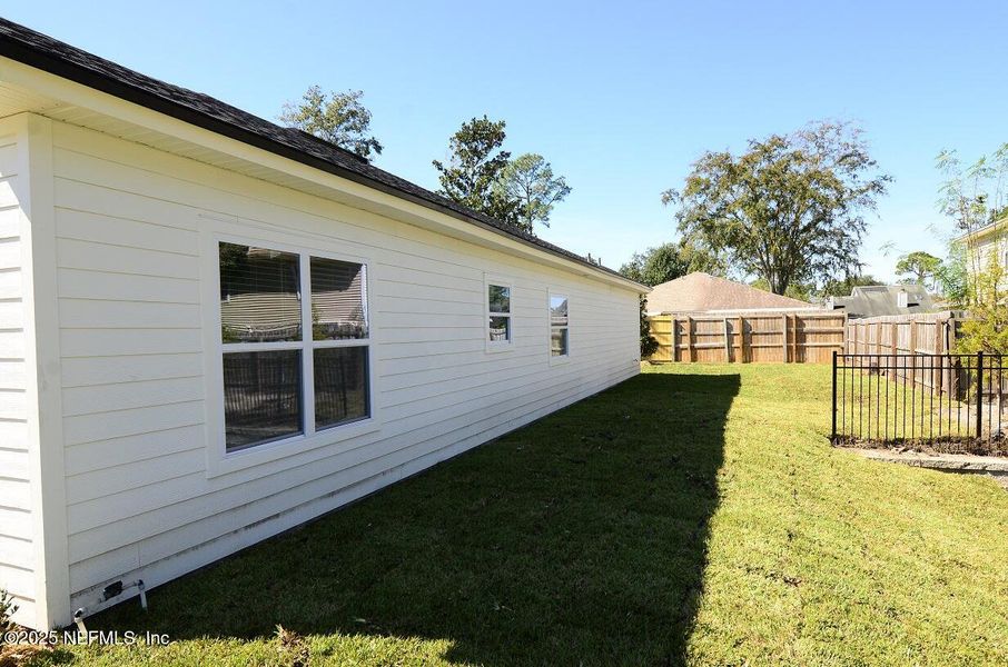 Exterior details and patio area of a home in , Jacksonville (Image 26). Exterior details and patio area of a home in , Jacksonville (Image 26).