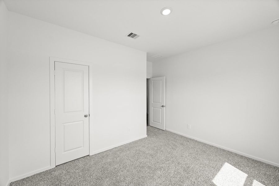 Spacious, unfurnished interior of a new home in Grand Pines, Magnolia (Image 22).