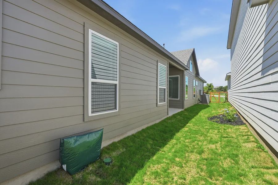 Exterior details and patio area of a home in The Crossvine, Schertz (Image 17). Exterior details and patio area of a home in The Crossvine, Schertz (Image 17).