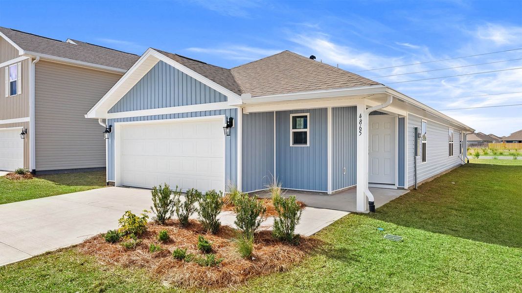 Front exterior of a new home in Titus Park, Panama City, FL, highlighting curb appeal (Image 1).