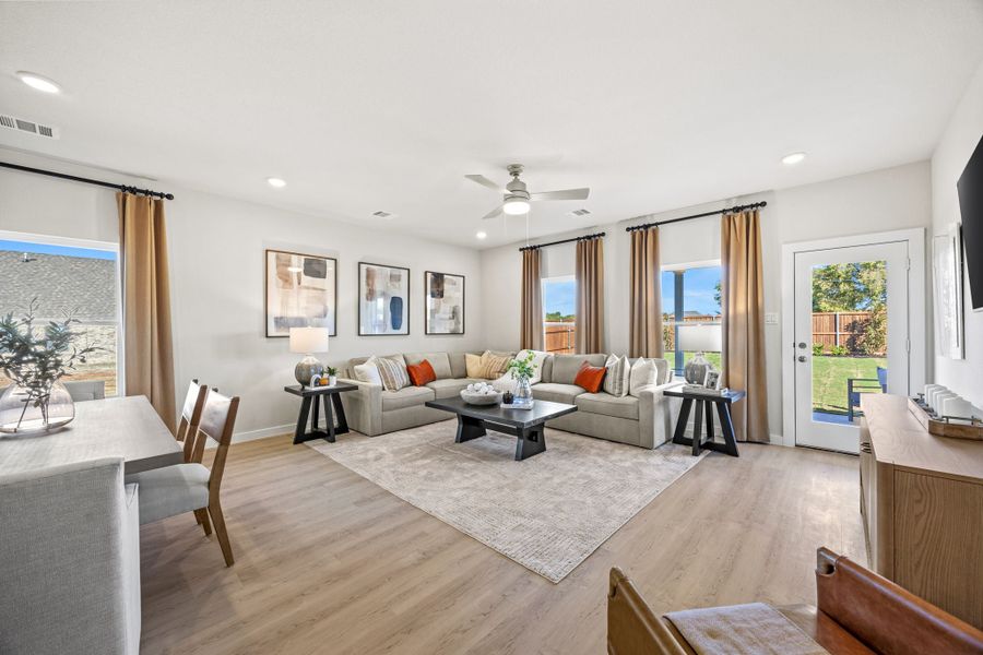 A living room with a large window.