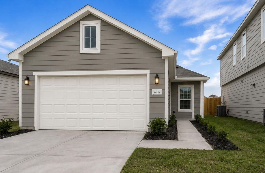 Front exterior of a new home in Crosby Terrace, Crosby, TX, highlighting curb appeal (Image 1). Front exterior of a new home in Crosby Terrace, Crosby, TX, highlighting curb appeal (Image 1).