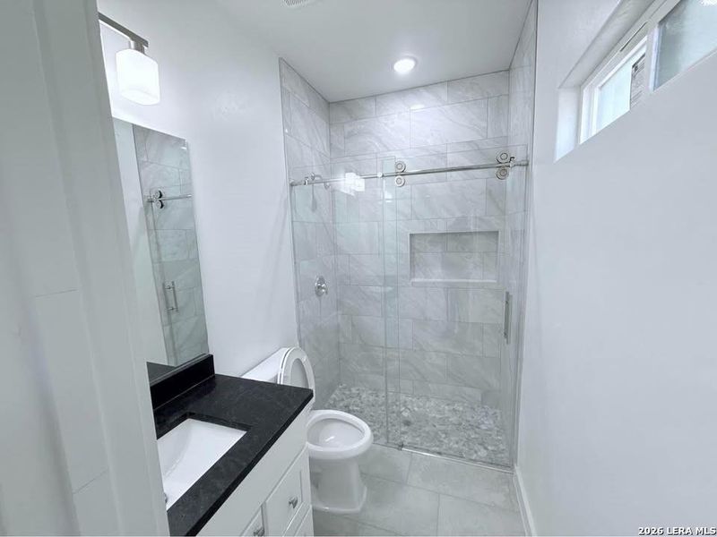 Furnished interior view inside a new home in , Devine (Image 4).