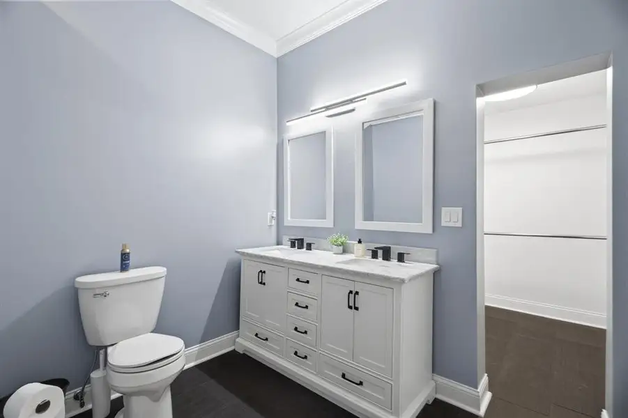 Primary bedroom with access to closet