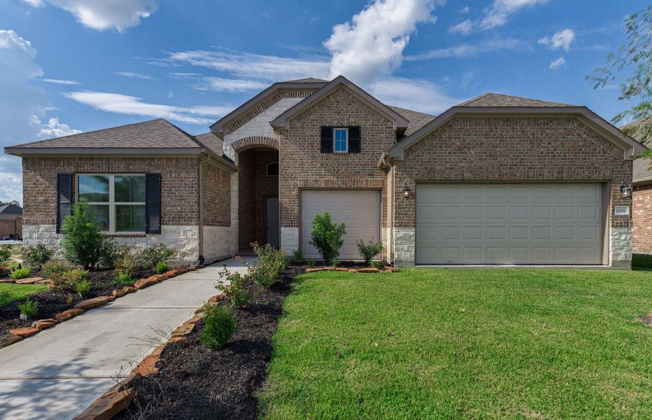 Representative exterior photo of a completed home built from the Floor Plan 2543 by Colina Homes in Grand Magnolia, Magnolia, TX (Image 2). Representative exterior photo of a completed home built from the Floor Plan 2543 by Colina Homes in Grand Magnolia, Magnolia, TX (Image 2).