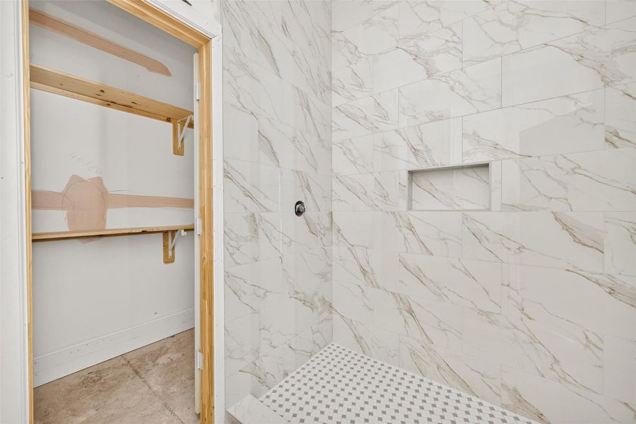 Full bath connected to the 5th bedroom with closet