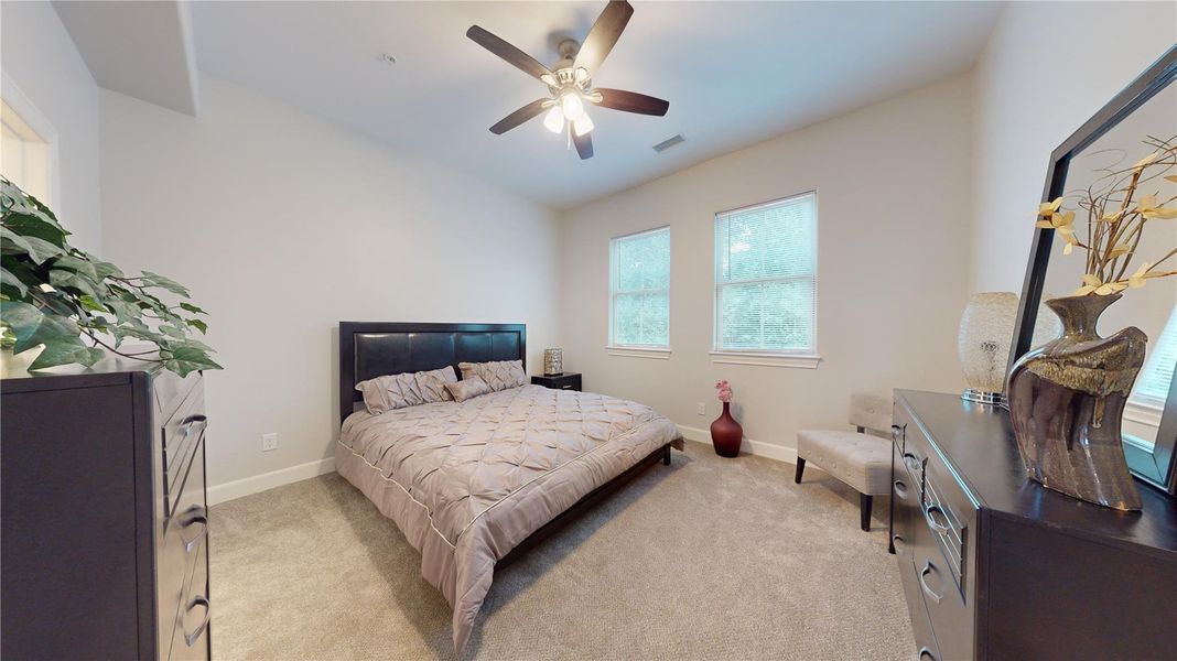 Furnished interior view inside a new home in , The Woodlands (Image 6).