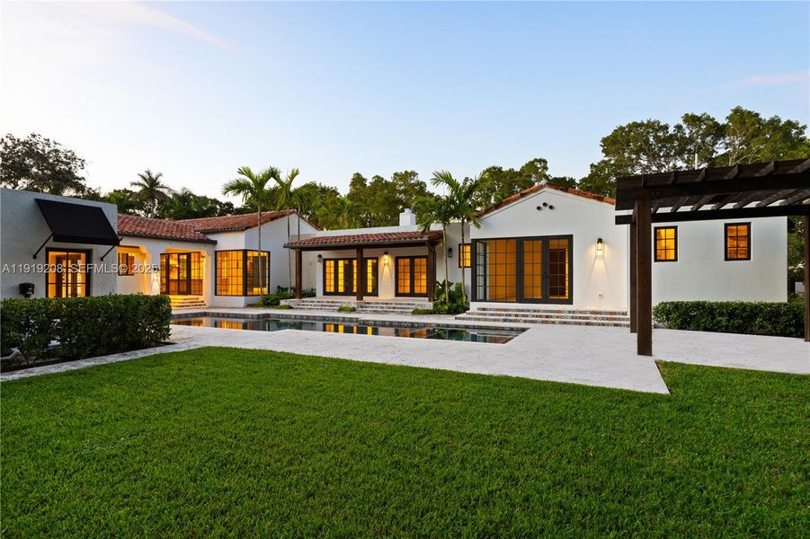 Front exterior of a new home in , Coral Gables, FL, highlighting curb appeal (Image 19). Front exterior of a new home in , Coral Gables, FL, highlighting curb appeal (Image 19).