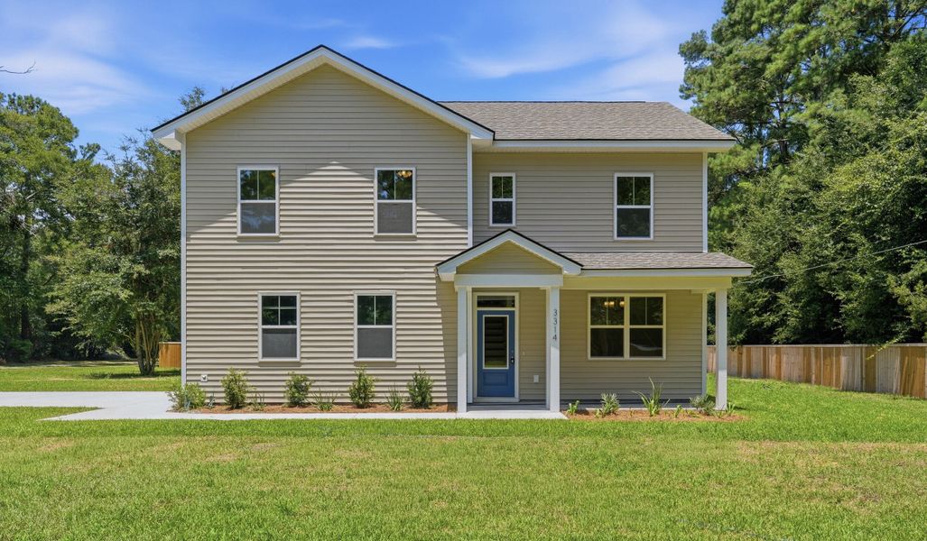 Front exterior of a new home in , Johns Island, SC, highlighting curb appeal (Image 2). Front exterior of a new home in , Johns Island, SC, highlighting curb appeal (Image 2).