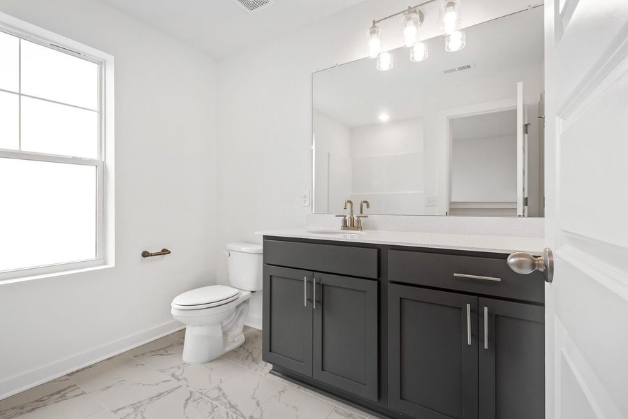 Furnished interior view inside a new home in Calista Farms, White House (Image 65).