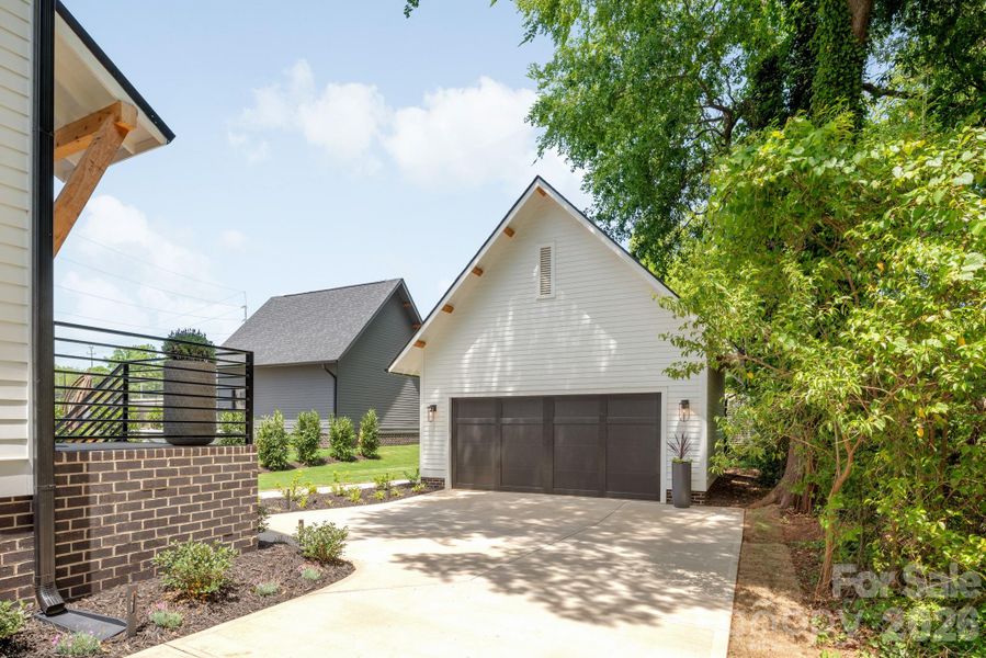 Front exterior of a new home in , Charlotte, NC, highlighting curb appeal (Image 24).
