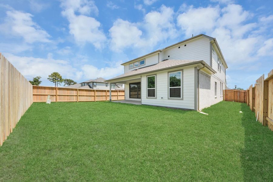 Explore the expansive backyard with its inviting covered patio—a perfect blend of space for the kids to play and adults to unwind. Ideal for creating your outdoor oasis, this backyard accommodates patio furniture, a BBQ pit, and endless possibilities for leisure and entertainment. Explore the expansive backyard with its inviting covered patio—a perfect blend of space for the kids to play and adults to unwind. Ideal for creating your outdoor oasis, this backyard accommodates patio furniture, a BBQ pit, and endless possibilities for leisure and entertainment.