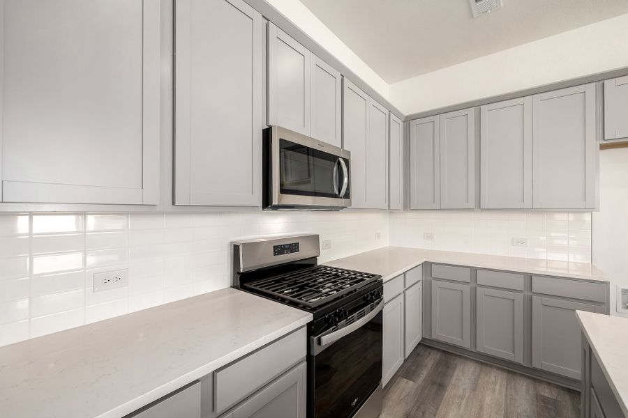 Furnished interior view inside a new home in Painted Prairie, Aurora (Image 12). Furnished interior view inside a new home in Painted Prairie, Aurora (Image 12).