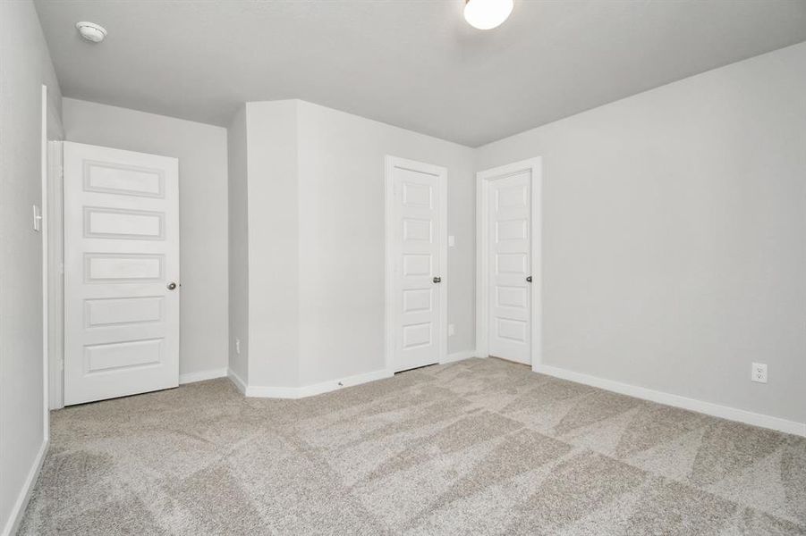 Generously sized secondary bedrooms, complete with spacious closets and soft, inviting carpeting. Enjoy abundant natural light streaming in through the large windows, complemented by privacy blinds for your personal sanctuary.