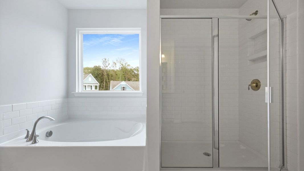 Representative furnished interior of a home built from the HARBOR OAK by D.R. Horton in Founders Corner, Summerville (Image 14).