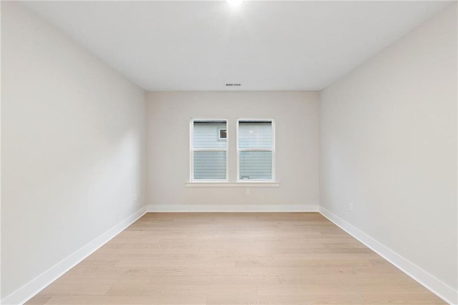 Spacious, unfurnished interior of a new home in Settingdown Farms, Cumming (Image 16).