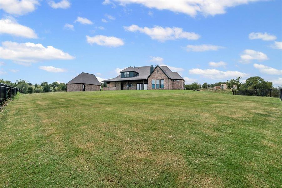 Front exterior of a new home in , Aledo, TX, highlighting curb appeal (Image 1). Front exterior of a new home in , Aledo, TX, highlighting curb appeal (Image 1).