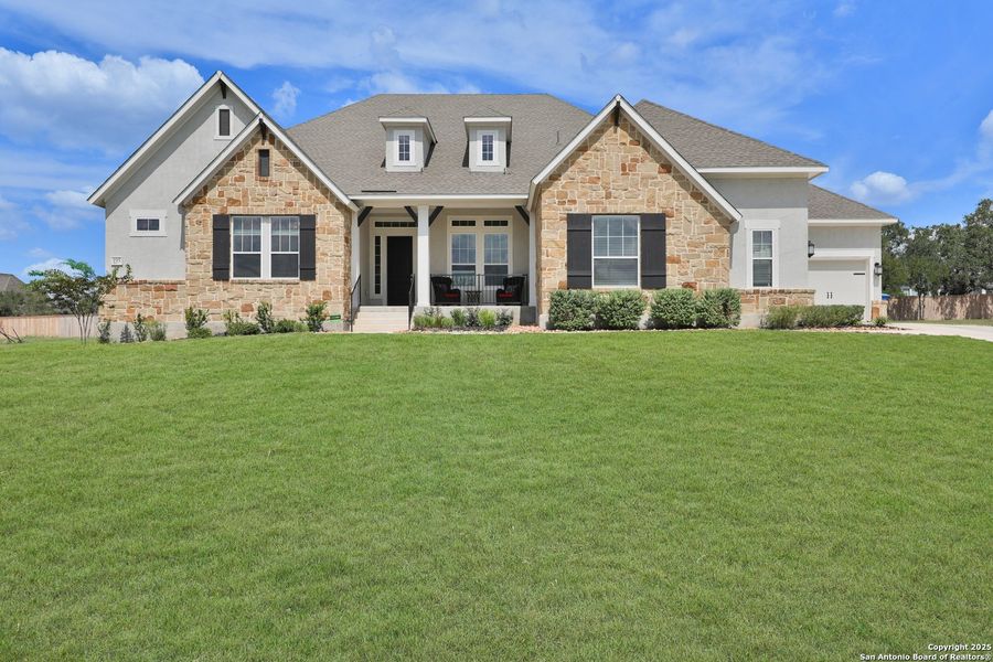Front exterior of a new home in Megans Landing – Half-Acre Homesites, Castroville, TX, highlighting curb appeal (Image 23). Front exterior of a new home in Megans Landing – Half-Acre Homesites, Castroville, TX, highlighting curb appeal (Image 23).