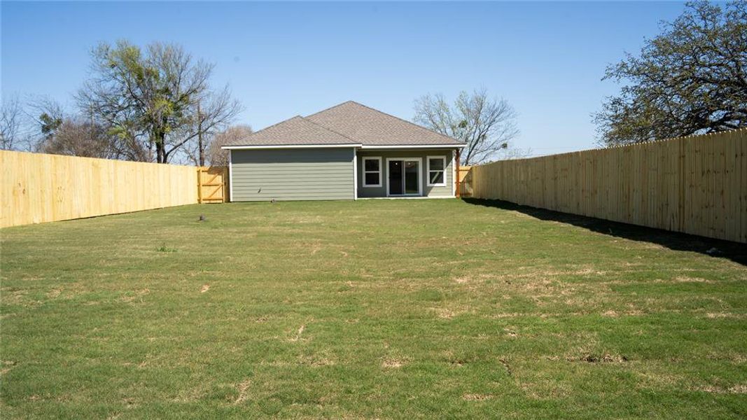 Exterior details and patio area of a home in , Denison (Image 17).