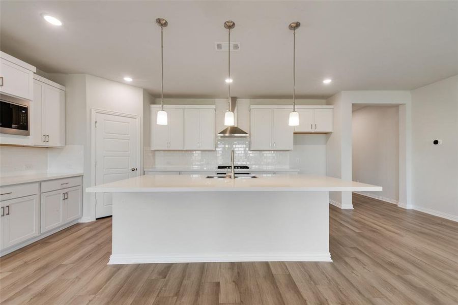 Furnished interior view inside a new home in Villages of Hurricane Creek, Anna (Image 12).