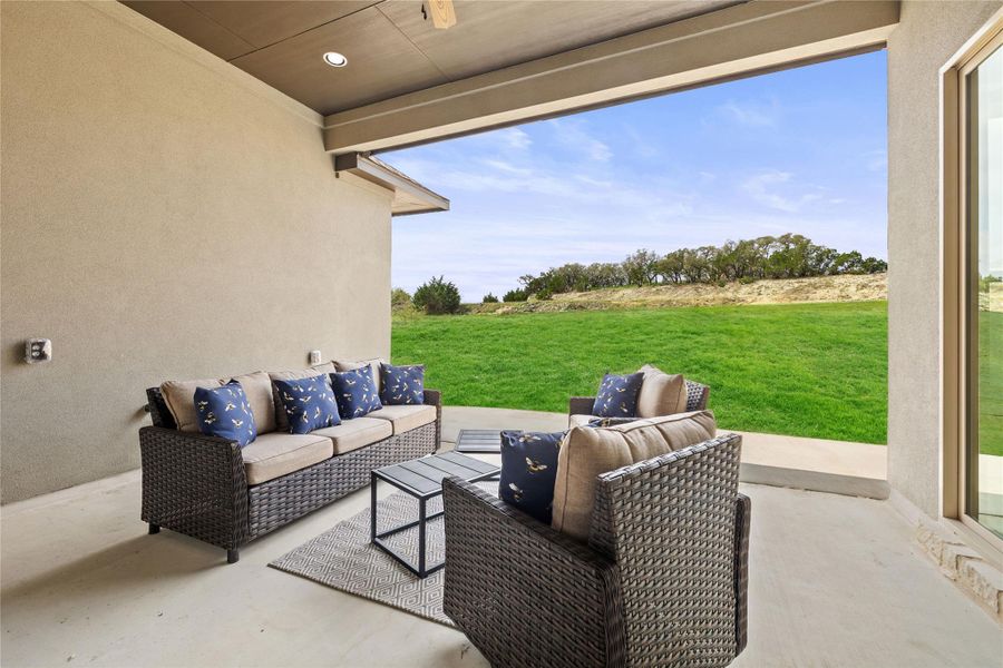 View of patio featuring an outdoor hangout area