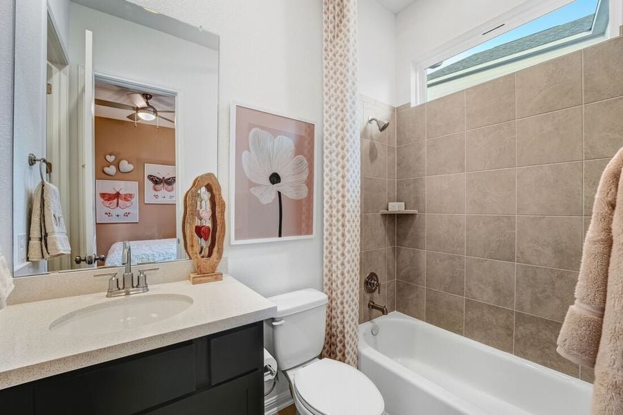 Representative furnished interior of a home built from the Burnet by Taylor Morrison in Village Grove, Dripping Springs (Image 16).
