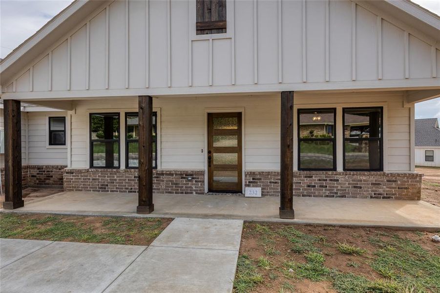 Front exterior of a new home in , Jacksboro, TX, highlighting curb appeal (Image 23).