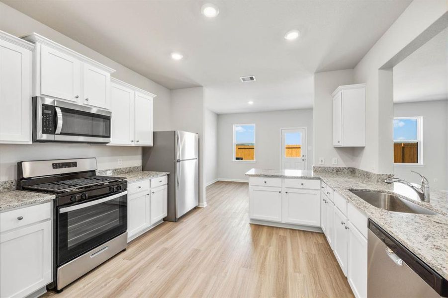 The kitchen with Whirlpool kitchen appliances.