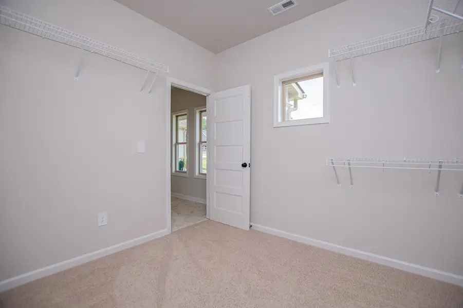 Spacious, unfurnished interior of a new home in WOODMONT RESERVE, Roopville (Image 57).