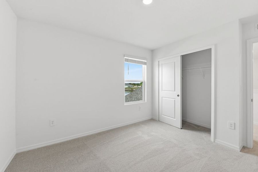 Representative unfurnished interior of a home built from the Redbud by Taylor Morrison in Firethorn, Parrish (Image 16).