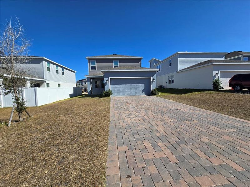 Exterior details and patio area of a home in Rhett's Ridge, Apopka (Image 20).