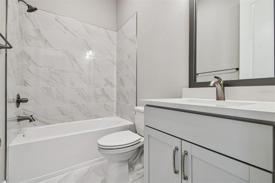 Furnished interior view inside a new home in Emerald Landing at Waterside at Lakewood Ranch – Cottage Series, Sarasota (Image 18). Furnished interior view inside a new home in Emerald Landing at Waterside at Lakewood Ranch – Cottage Series, Sarasota (Image 18).