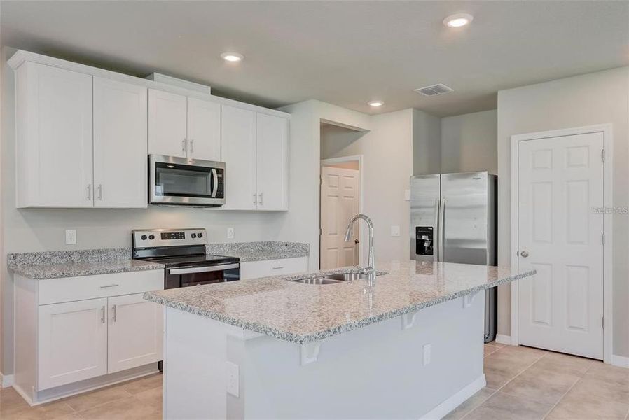 Furnished interior view inside a new home in , Davenport (Image 6).