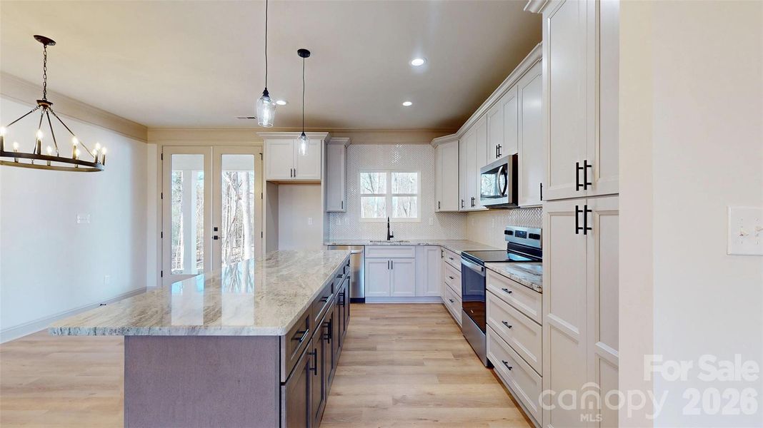 Furnished interior view inside a new home in , Monroe (Image 9).