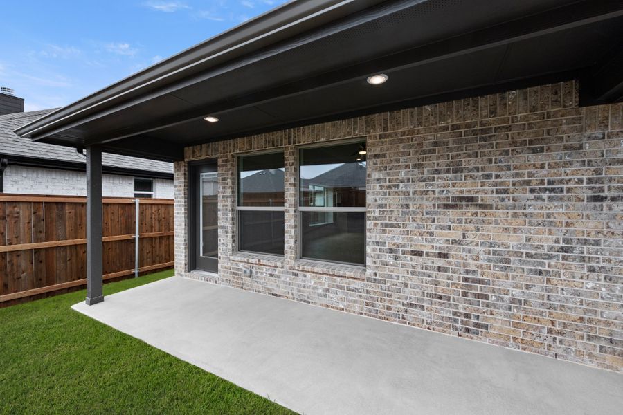 Exterior details and patio area of a home in Silo Mills, Joshua (Image 3).