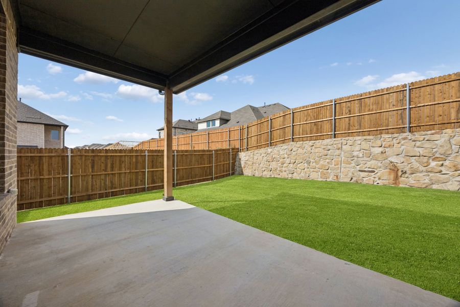 Exterior details and patio area of a home in Country Lakes, Denton (Image 3). Exterior details and patio area of a home in Country Lakes, Denton (Image 3).