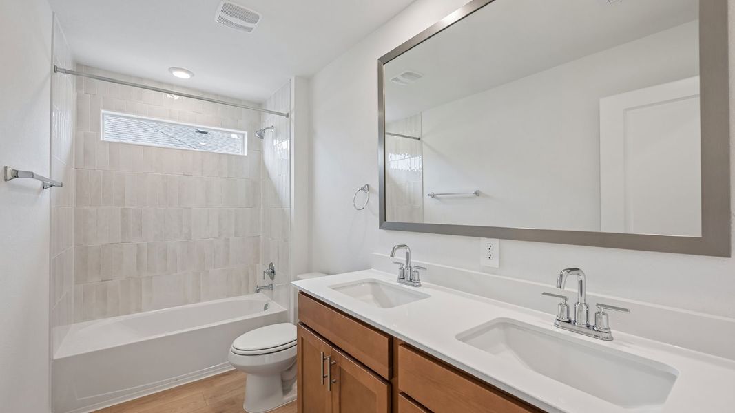 Furnished interior view inside a new home in The Enclave at Bar W Ranch, Leander (Image 15).