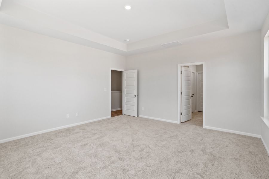 Spacious, unfurnished interior of a new home in Sweetbrier, Durham (Image 23).