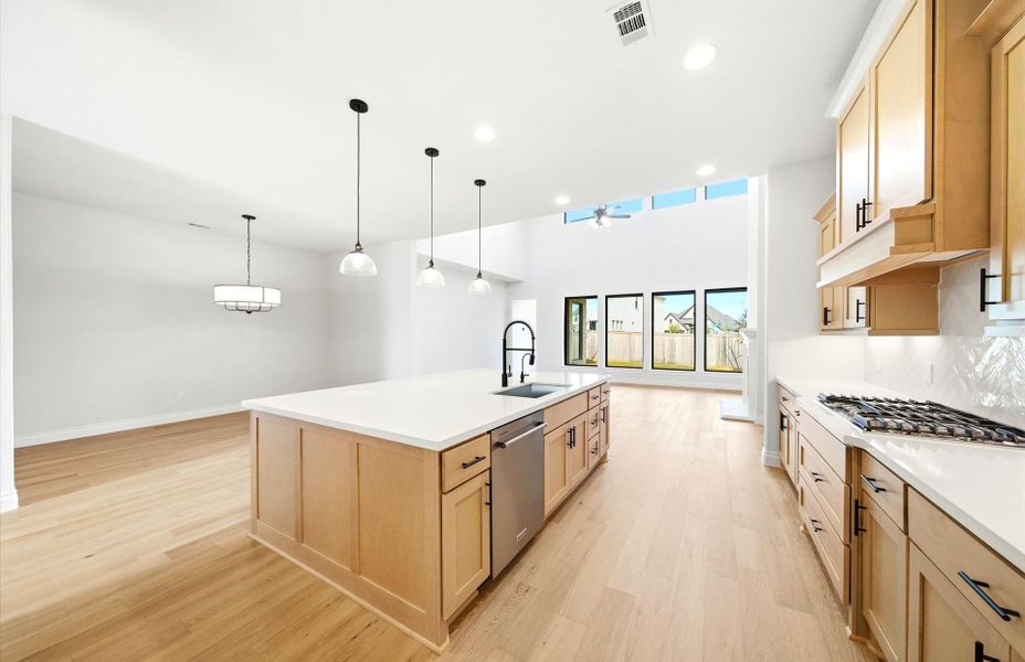 Furnished interior view inside a new home in Bridgeland 50', Cypress (Image 10).