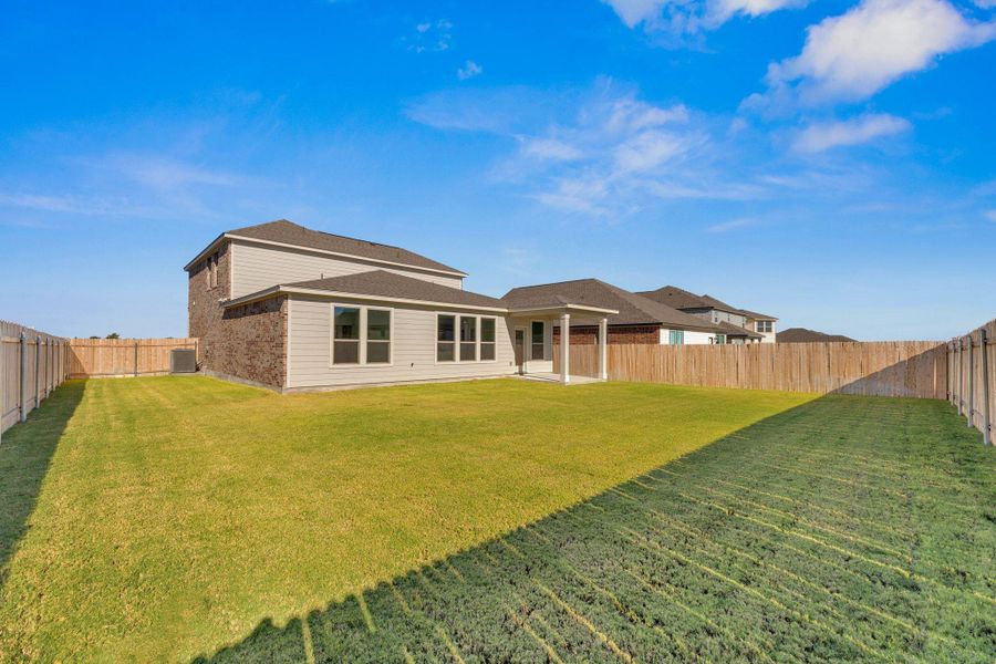 Exterior details and patio area of a home in Mustang Valley, Manor (Image 17). Exterior details and patio area of a home in Mustang Valley, Manor (Image 17).